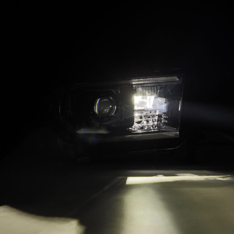 Load image into Gallery viewer, AlphaRex 07-13 Toyota Tundra / 08-17 Sequoia LUXX LED Proj HL Alpha-Blk w/Actv Light Seq. Sig + DRL
