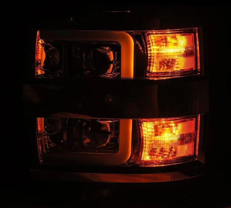 Load image into Gallery viewer, AlphaRex 15-19 Chevy Silverado 2500/3500 LUXX-Series Proj. Headlights Blk w/Actv SeqSig &amp; SBDRL
