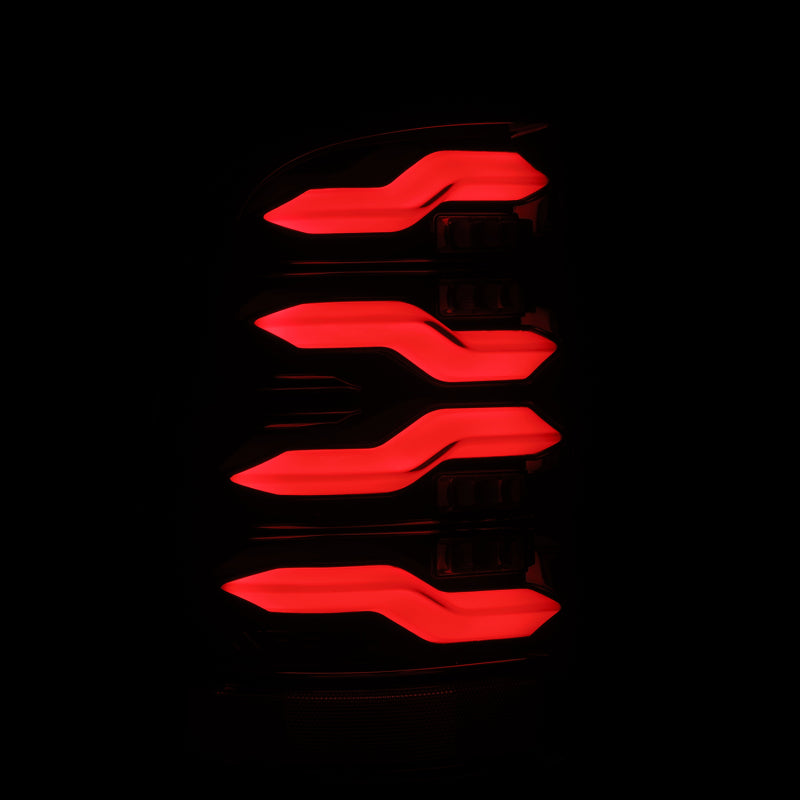 Load image into Gallery viewer, AlphaRex 09-18 Dodge Ram Luxx-Series LED Tail Lights Black w/ Activation Light &amp; Sequential Signal
