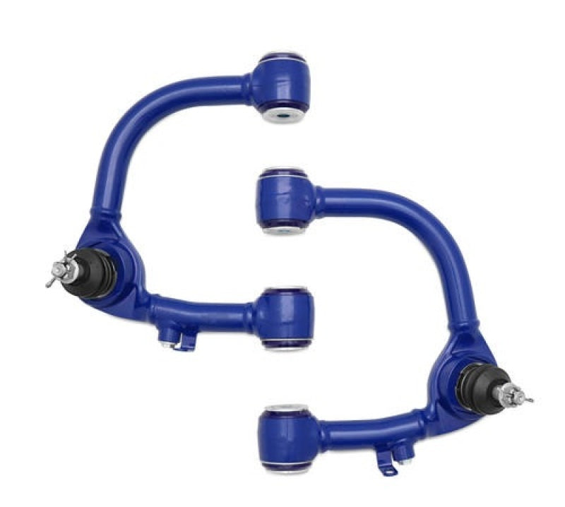 Load image into Gallery viewer, SuperPro Toyota Land Cruiser 100 Series Front Upper Fixed Offset Control Arm Set
