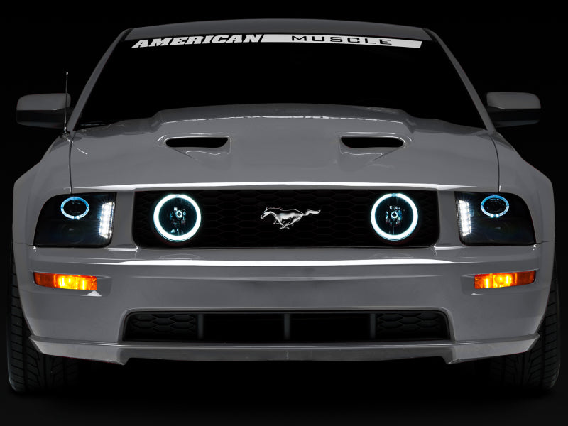 Load image into Gallery viewer, Raxiom 05-09 Ford Mustang w/ Halogen LED Halo Prjctr Headlights-Blk Hsng(Smoked Lens Exclude GT500)
