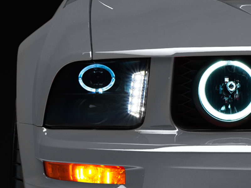 Load image into Gallery viewer, Raxiom 05-09 Ford Mustang w/ Halogen LED Halo Prjctr Headlights-Blk Hsng(Smoked Lens Exclude GT500)
