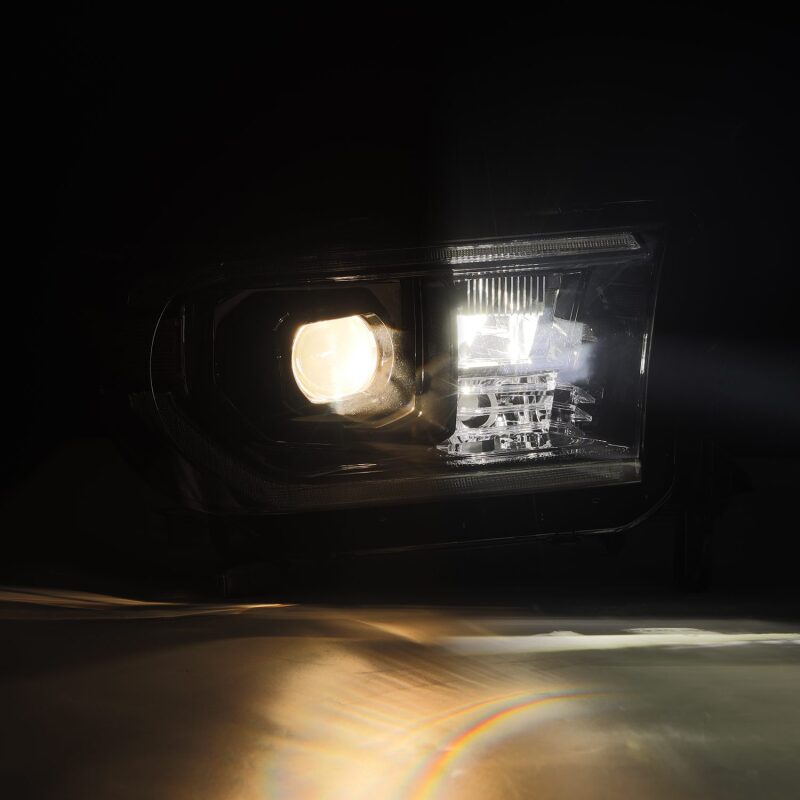 Load image into Gallery viewer, AlphaRex 07-13 Toyota Tundra / 08-17 Sequoia LUXX LED Proj HL Alpha-Blk w/Actv Light Seq. Sig + DRL
