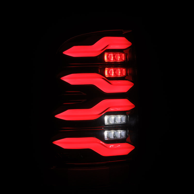 Load image into Gallery viewer, AlphaRex 09-18 Dodge Ram Luxx-Series LED Tail Lights Black w/ Activation Light &amp; Sequential Signal
