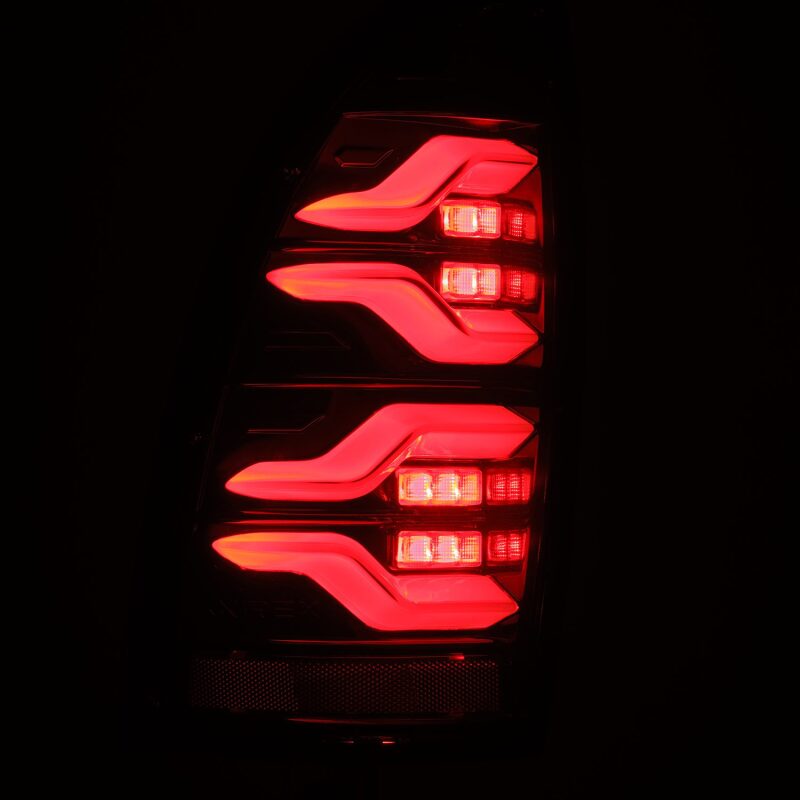 Load image into Gallery viewer, AlphaRex 05-15 Toyota Tacoma LUXX LED Taillights Alpha Blk w/Activ Light/Seq Signal
