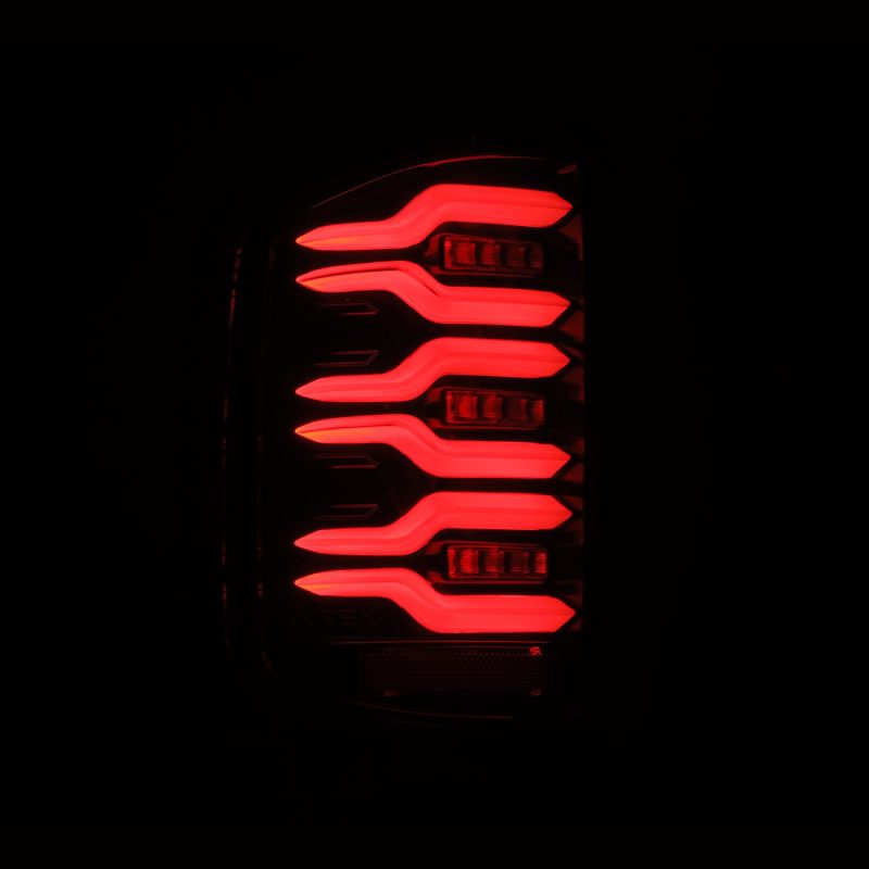 Load image into Gallery viewer, AlphaRex 14-18 Chevy Silverado 1500 Luxx-Series LED Tail Lights Alpha-Black w/Activ Light/Seq Signal
