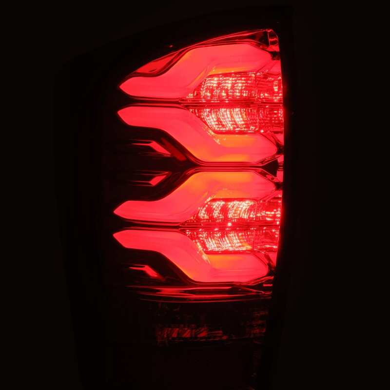 Load image into Gallery viewer, AlphaRex 16-21 Toyota Tacoma LUXX LED Taillights Blk/Red w/Activ Light/Seq Signal
