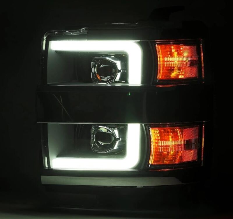 Load image into Gallery viewer, AlphaRex 15-19 Chevy Silverado 2500/3500 LUXX-Series Proj. Headlights Blk w/Actv SeqSig &amp; SBDRL
