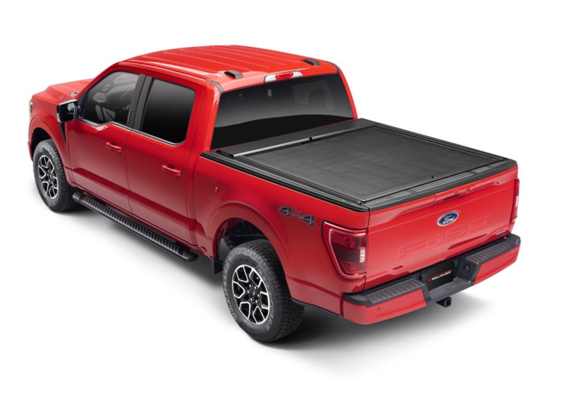 Load image into Gallery viewer, Roll-N-Lock 20-22 Chevrolet Silverado 2500-3500 (82.2in. Bed) M-Series XT Retractable Tonneau Cover
