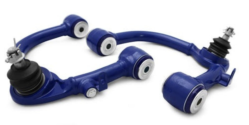 Load image into Gallery viewer, SuperPro Toyota Land Cruiser 100 Series Front Upper Fixed Offset Control Arm Set
