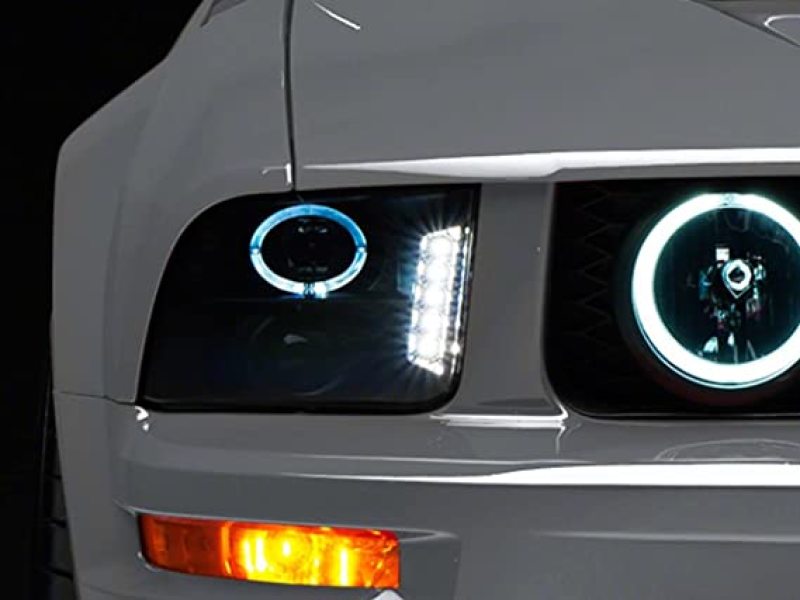 Load image into Gallery viewer, Raxiom 05-09 Ford Mustang w/ Halogen LED Halo Prjctr Headlights-Blk Hsng(Smoked Lens Exclude GT500)
