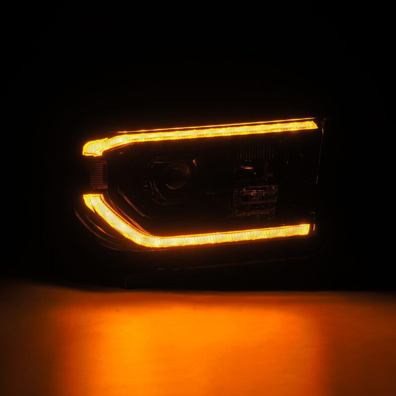 Load image into Gallery viewer, AlphaRex 07-13 Toyota Tundra / 08-17 Sequoia LUXX LED Proj HL Alpha-Blk w/Actv Light Seq. Sig + DRL
