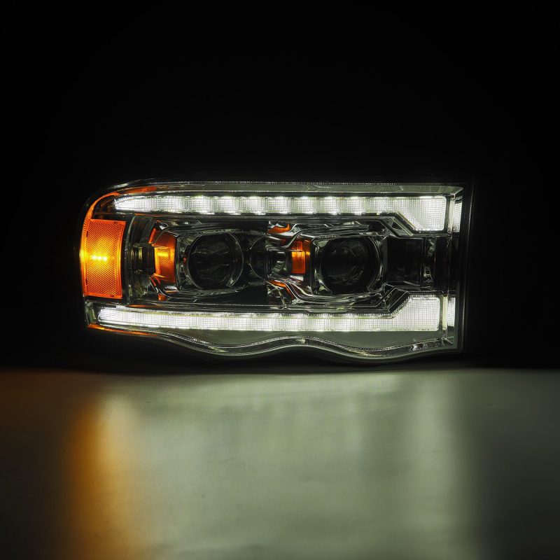 Load image into Gallery viewer, AlphaRex 02-05 Dodge Ram 1500 LUXX LED Proj Headlights Plank Style Chrome w/Activ Light/Seq Signal
