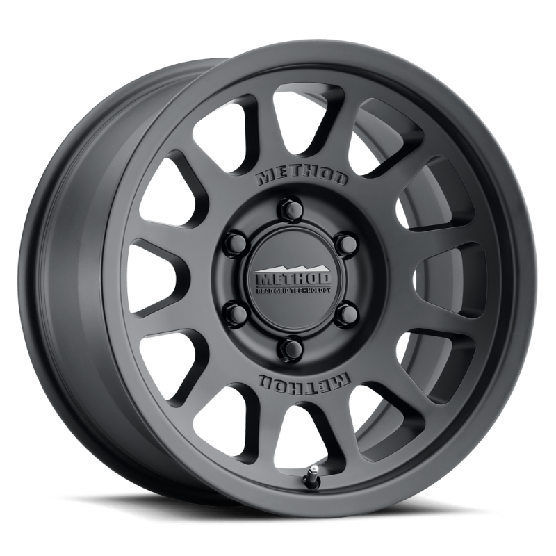 Load image into Gallery viewer, Method MR703 17x8.5 +25mm Offset 6x135 87mm CB Matte Black Wheel
