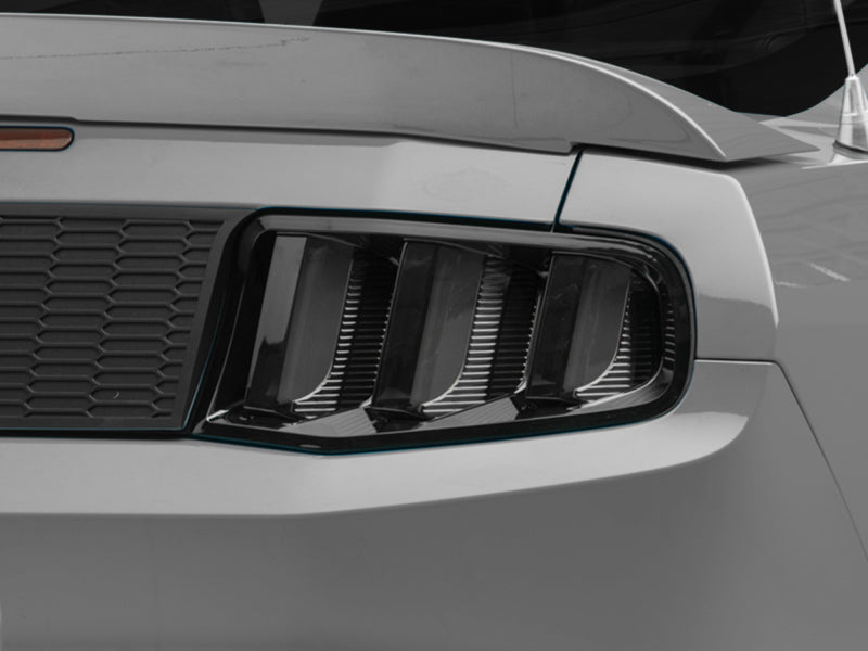 Load image into Gallery viewer, Raxiom 10-12 Ford Mustang Vector V2 LED Tail Lights - Gloss Black Housing (Clear Lens)
