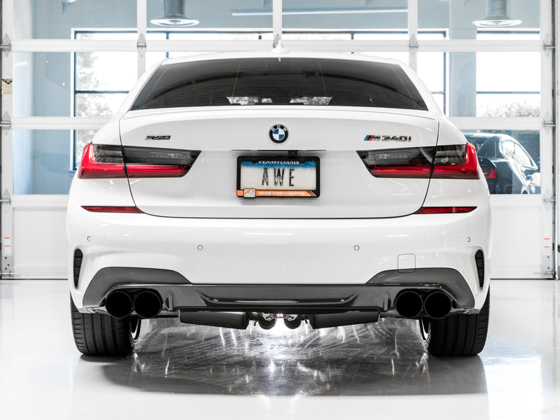 Load image into Gallery viewer, AWE Tuning 2019+ BMW M340i (G20) Resonated Touring Edition Exhaust - Quad Diamond Black Tips
