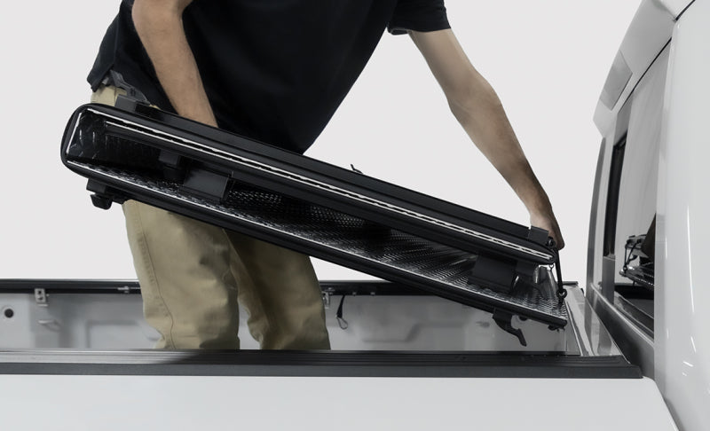 Load image into Gallery viewer, Access LOMAX Tri-Fold Cover Black Urethane Finish 20+ GM 2500/3500 - 6ft 8in Bed
