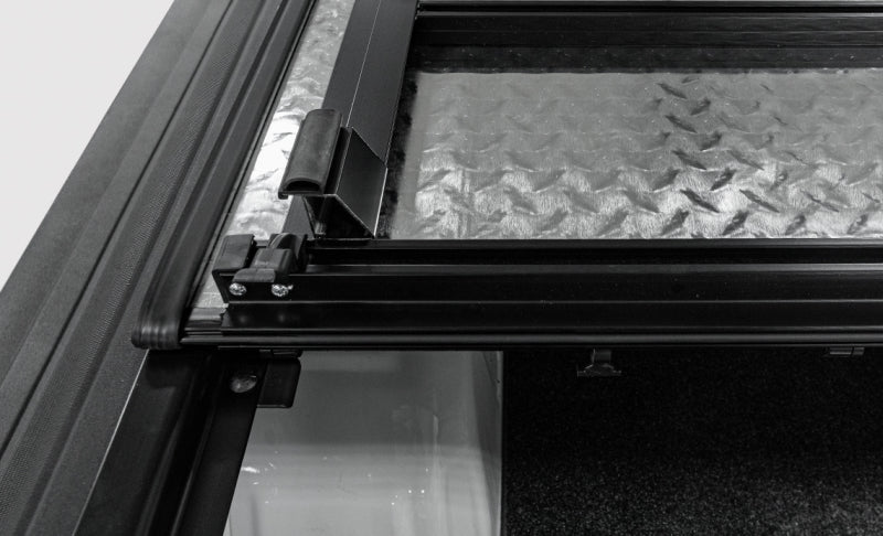 Load image into Gallery viewer, Access LOMAX Tri-Fold Cover Black Urethane Finish 20+ GM 2500/3500 - 6ft 8in Bed

