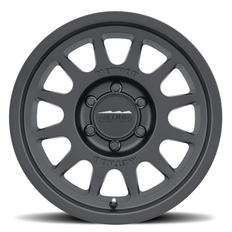 Load image into Gallery viewer, Method MR703 17x8.5 +25mm Offset 6x135 87mm CB Matte Black Wheel
