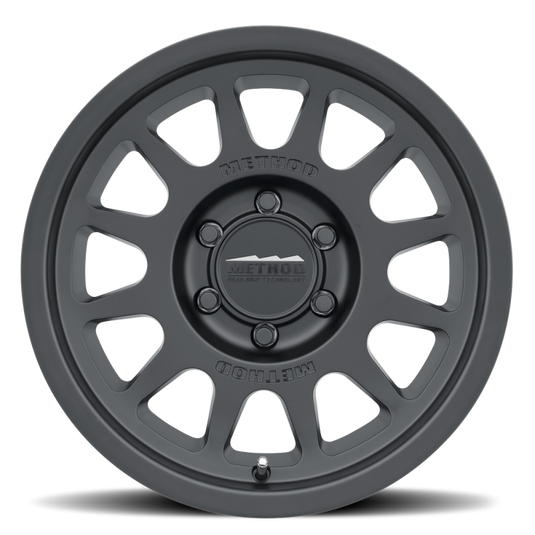 Method MR703 17x8.5 +25mm Offset 6x135 87mm CB Matte Black Wheel