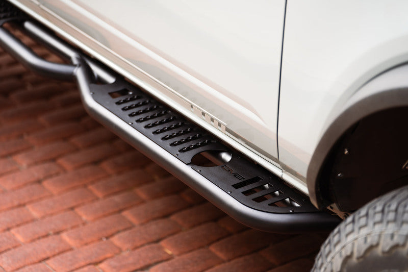 Load image into Gallery viewer, DV8 Offroad 21-22 Ford Bronco OE Plus Series Side Steps
