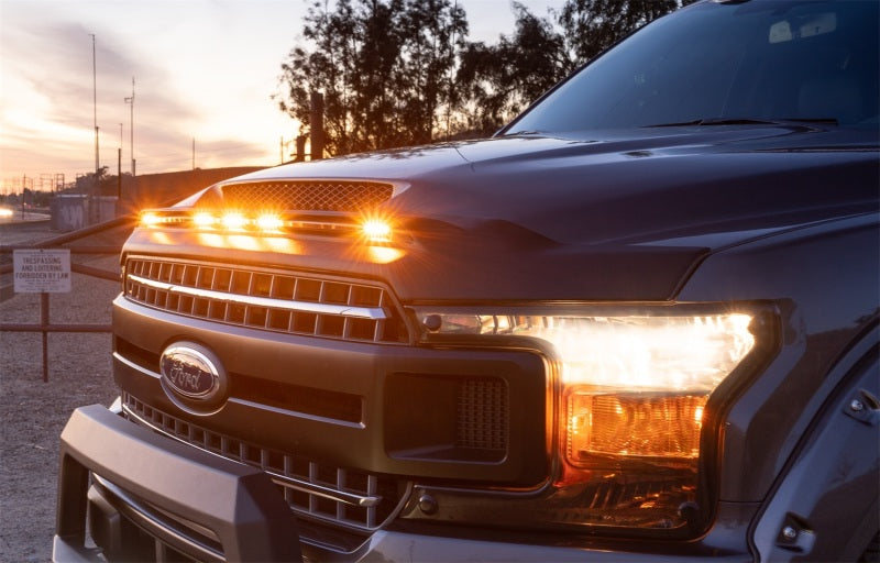 Load image into Gallery viewer, AVS 2019 Dodge Ram 1500 Aeroskin Low Profile Hood Shield w/ Lights - Black
