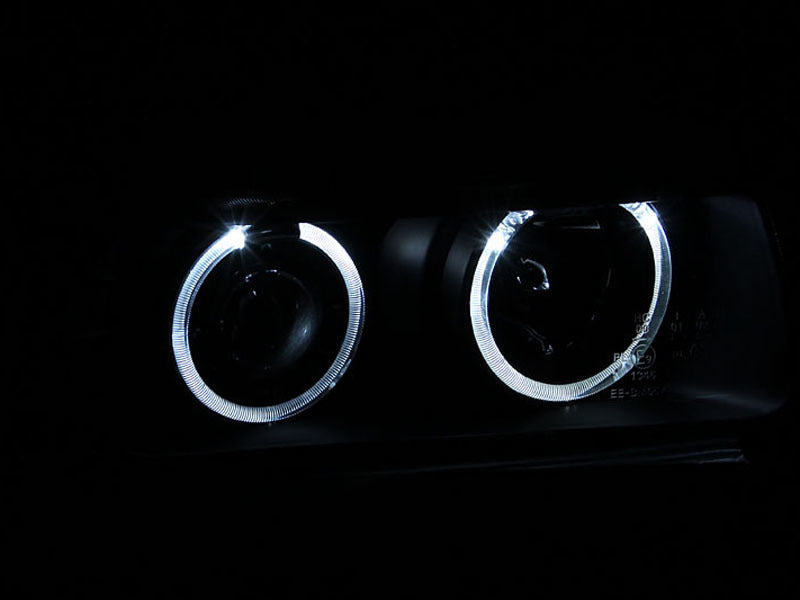 Load image into Gallery viewer, ANZO 1992-1998 BMW 3 Series E36 Projector Headlights w/ Halo Black (CCFL) G2
