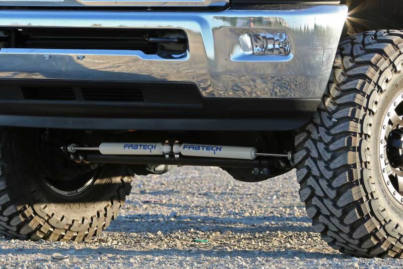 Load image into Gallery viewer, Fabtech 14-18 Ram 2500/3500 4WD Dual Steering Stabilizer System w/Perf. Shocks
