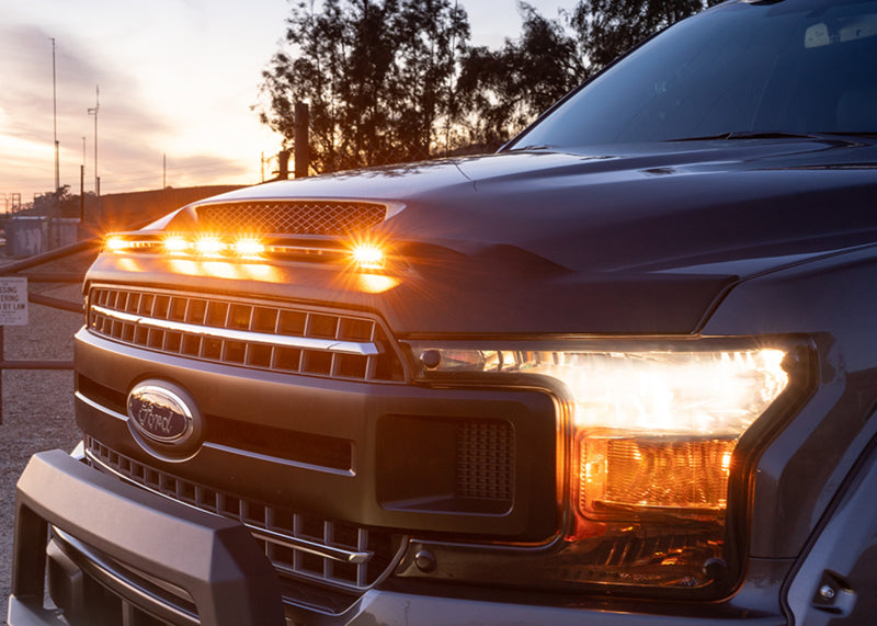 Load image into Gallery viewer, AVS 2019 Dodge Ram 1500 Aeroskin Low Profile Hood Shield w/ Lights - Black
