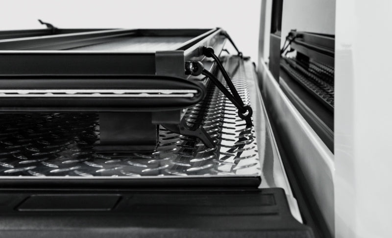Load image into Gallery viewer, Access LOMAX Tri-Fold Cover Black Urethane Finish 20+ GM 2500/3500 - 6ft 8in Bed
