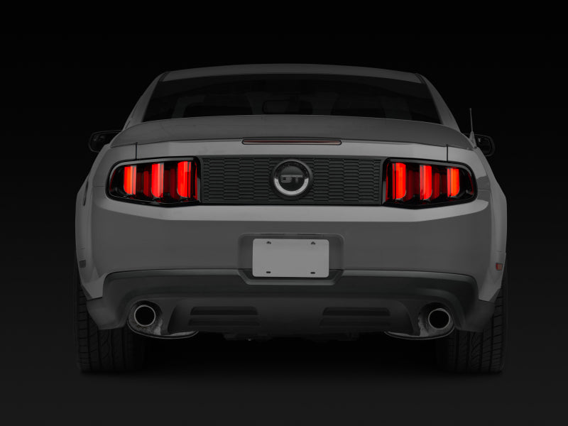 Load image into Gallery viewer, Raxiom 10-12 Ford Mustang Vector V2 LED Tail Lights - Gloss Black Housing (Clear Lens)
