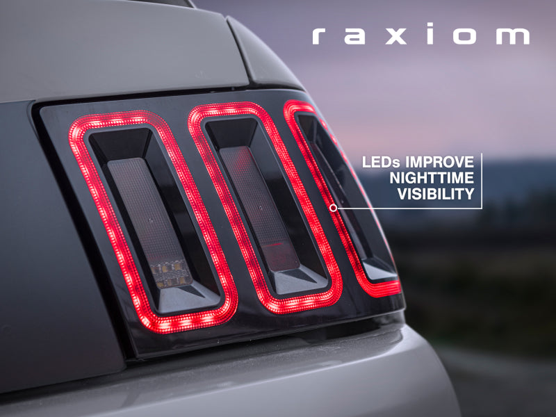 Load image into Gallery viewer, Raxiom 99-04 Ford Mustang Excluding 99-01 Cobra Icon LED Tail Lights- Black Housing (Smoked Lens)
