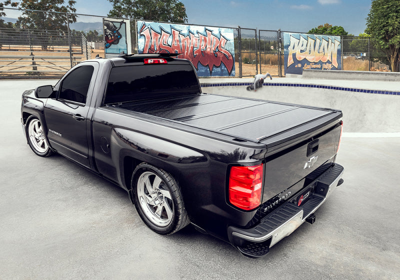 Load image into Gallery viewer, BAK 17-23 Ford Super Duty 6ft 9in Bed BAKFlip G2
