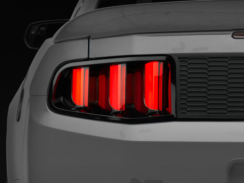 Load image into Gallery viewer, Raxiom 10-12 Ford Mustang Vector V2 LED Tail Lights - Gloss Black Housing (Clear Lens)
