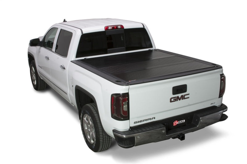 Load image into Gallery viewer, BAK 04-14 Chevy Silverado 5ft 8in Bed BAKFlip G2
