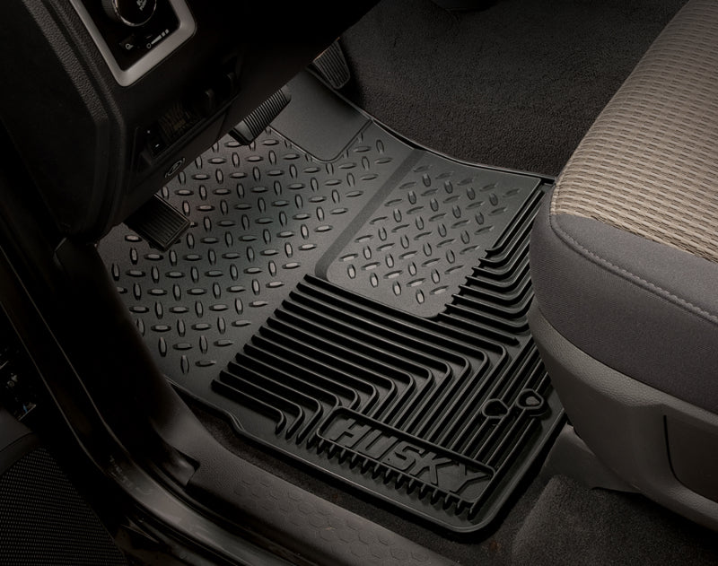 Load image into Gallery viewer, Husky Liners 80-12 Ford F-150/00-05 Ford Excursion Heavy Duty Black 2nd Row Floor Mats
