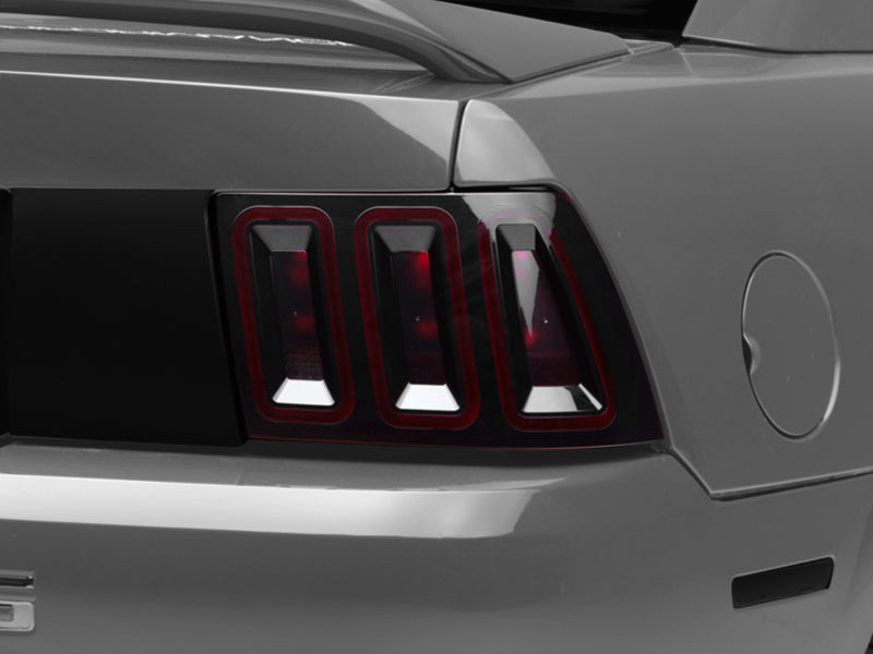 Load image into Gallery viewer, Raxiom 99-04 Ford Mustang Excluding 99-01 Cobra Icon LED Tail Lights- Black Housing (Smoked Lens)
