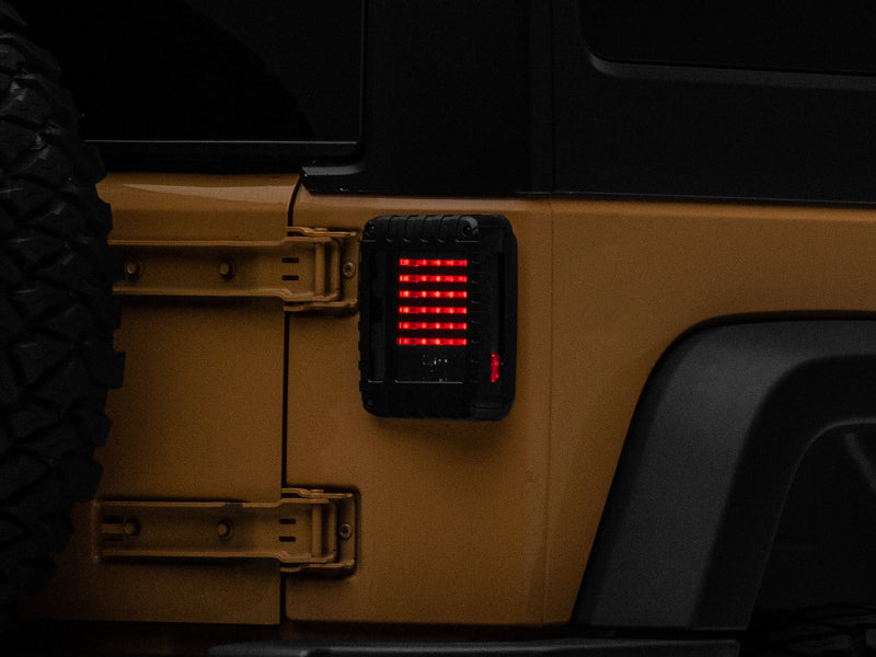 Load image into Gallery viewer, Raxiom 07-18 Jeep Wrangler JK LED Tail Lights- Black Housing (Smoked Lens)
