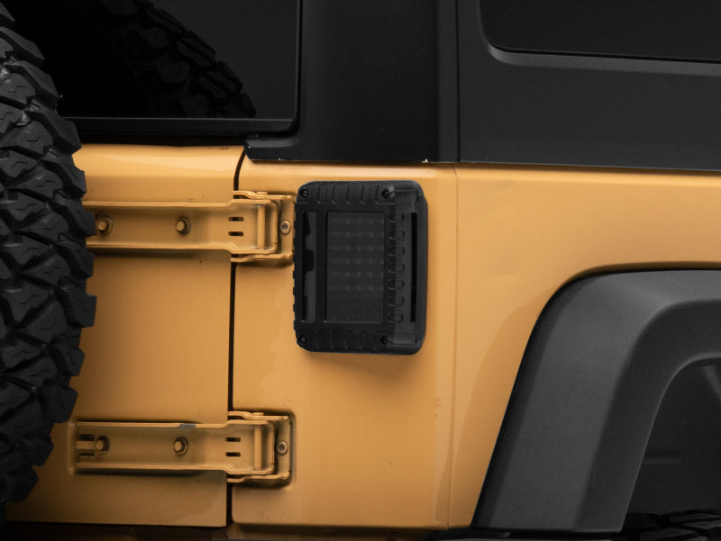Load image into Gallery viewer, Raxiom 07-18 Jeep Wrangler JK LED Tail Lights- Black Housing (Smoked Lens)
