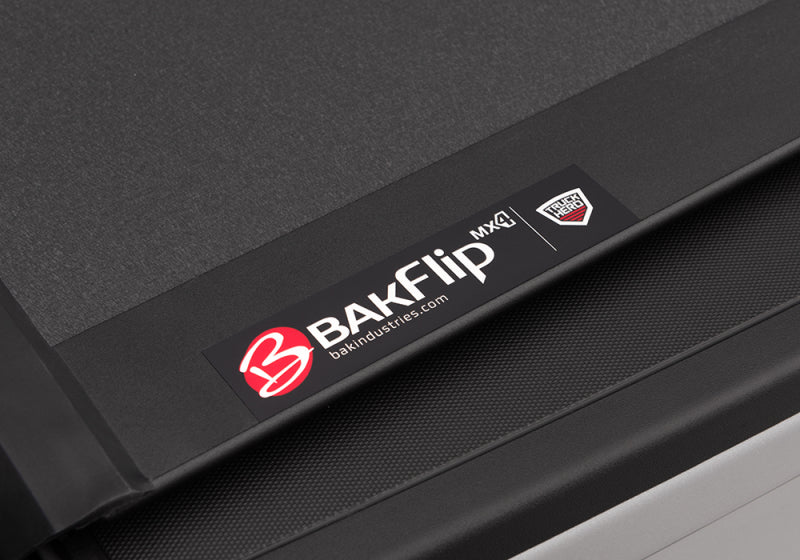 Load image into Gallery viewer, BAK 04-14 Chevy Silverado 1500 5ft 8in Bed BAKFlip MX4 Matte Finish
