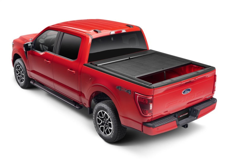 Load image into Gallery viewer, Roll-N-Lock 21-22 Ford F150 (w/o OE Cargo Tracks - 67.1in Bed) M-Series XT Retractable Tonneau Cover
