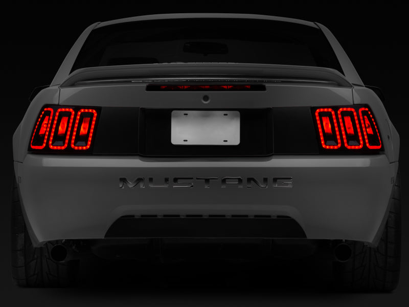 Load image into Gallery viewer, Raxiom 99-04 Ford Mustang Excluding 99-01 Cobra Icon LED Tail Lights- Black Housing (Smoked Lens)
