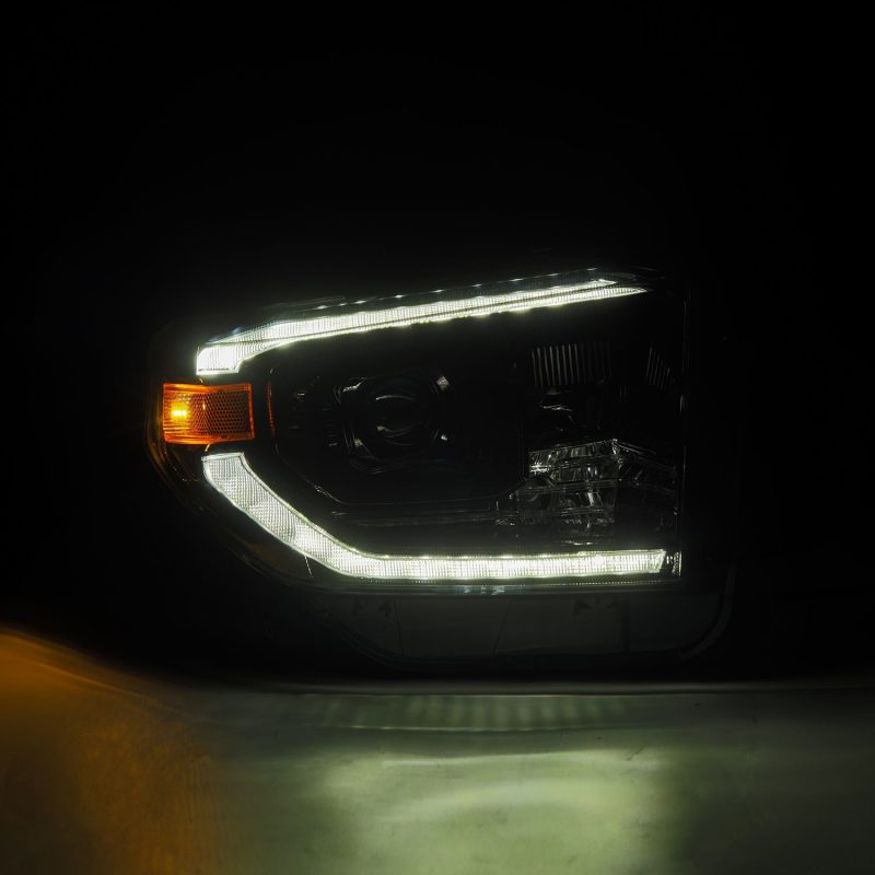 Load image into Gallery viewer, AlphaRex 14-21 Toyota Tundra PRO-Series Projector Headlights Black w/Seq. Sig. + DRL
